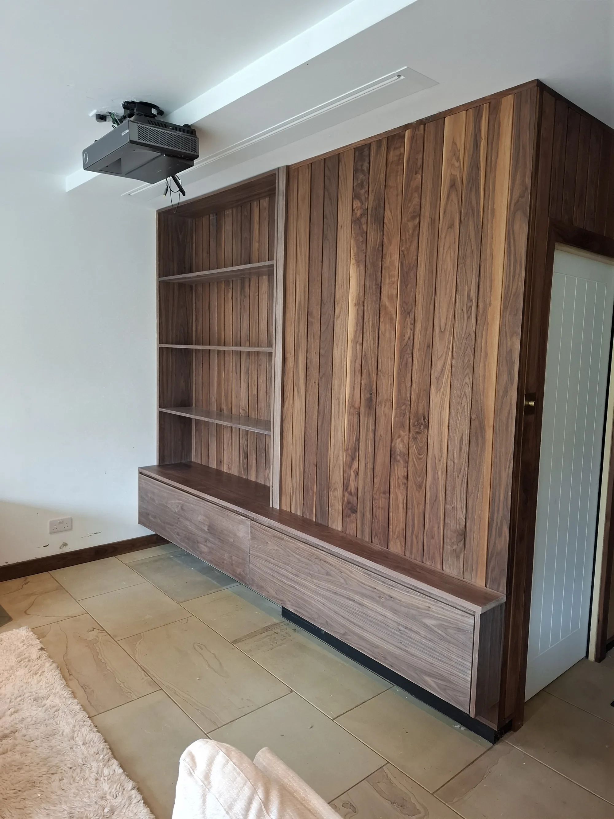 Walnut media wall from the side