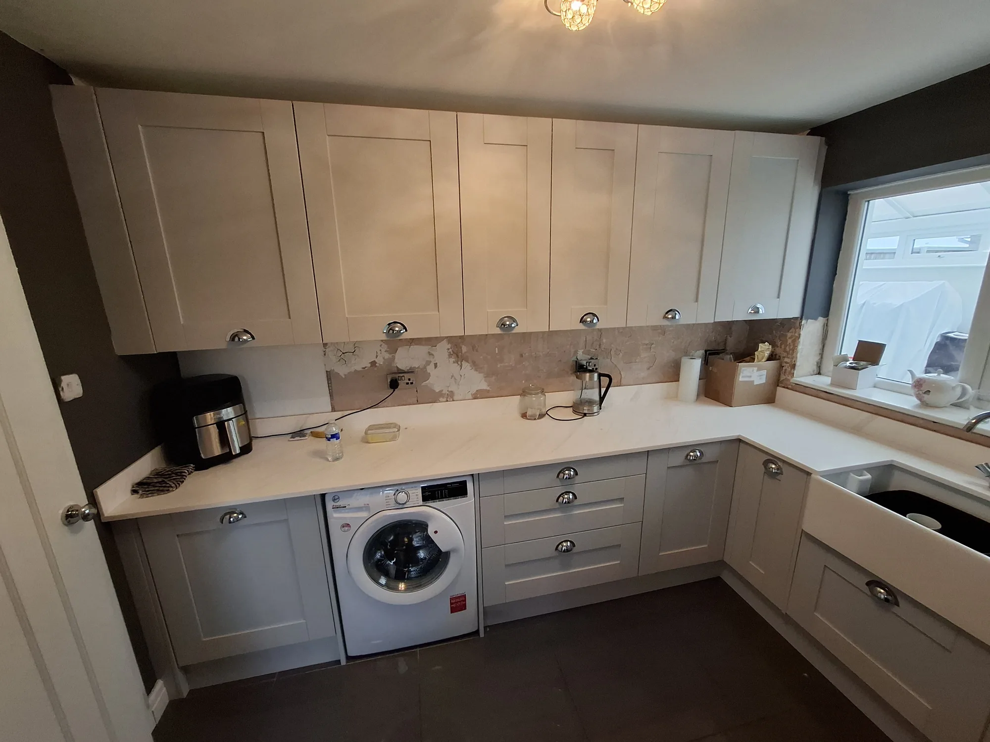 Wall and base units with Belfast sink and worktops