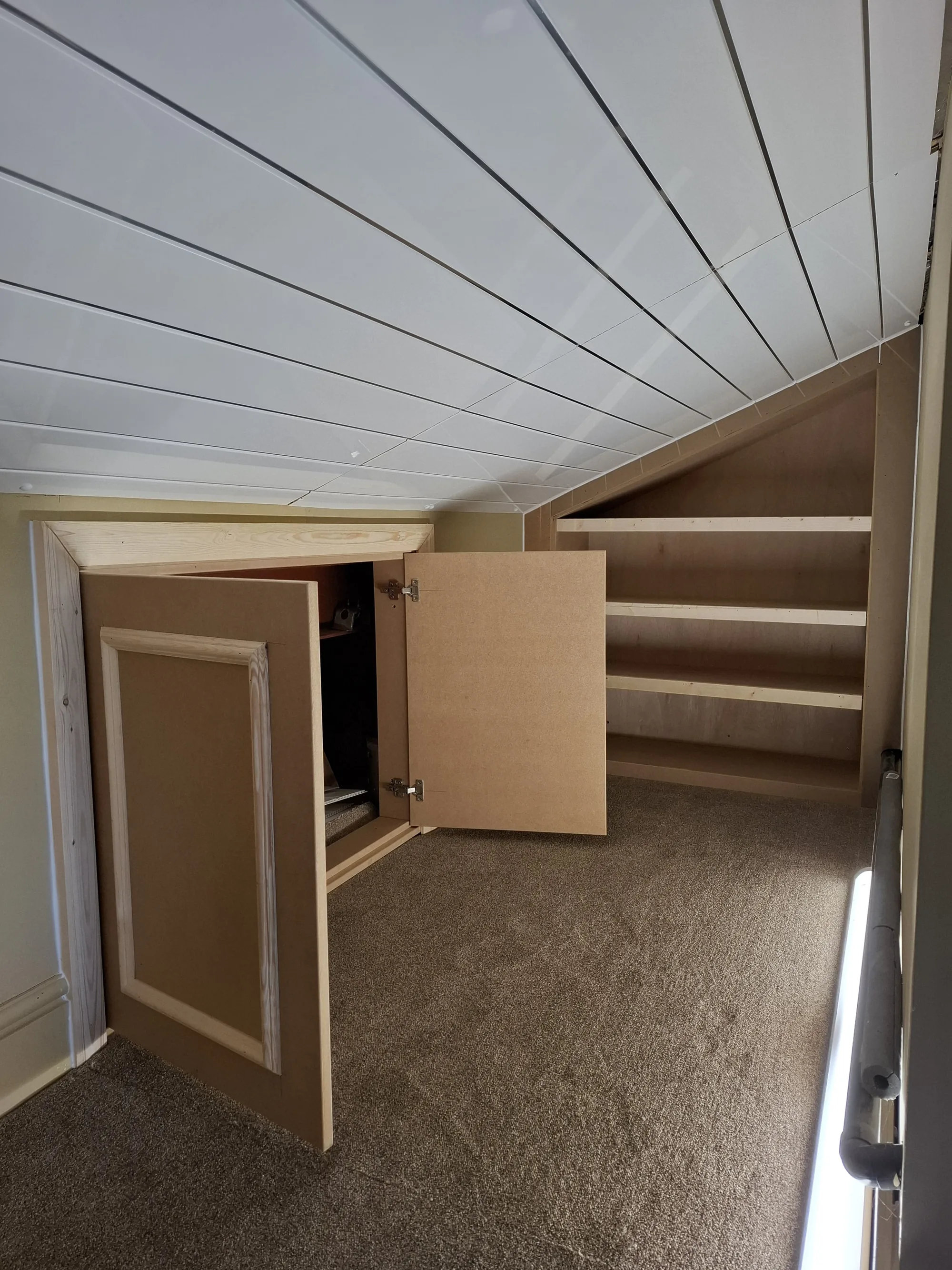 Eaves doors open with storage behind